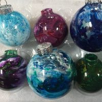 Glass Ornaments hand painted by Lahle Wolfe, blue, purple. green tones