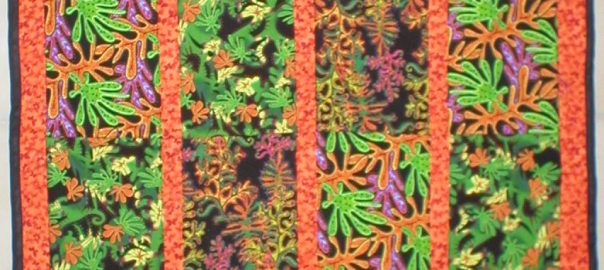 Hot Orange Foliage Quilt by Lahle Wolfe
